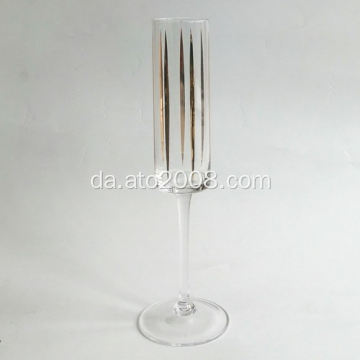 Champagnefløjtglas med guldmærkat